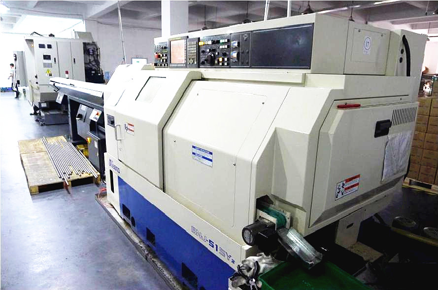Double spindle CNC turning center
